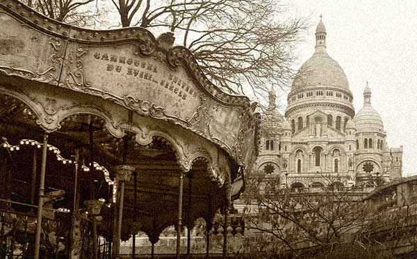 Old photograph of a carousel outside of Notre Dame in Paris