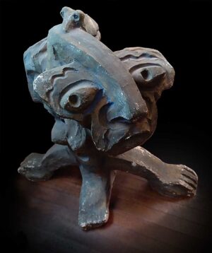 Dark painted sculpture of distorted gargoyle-like creature